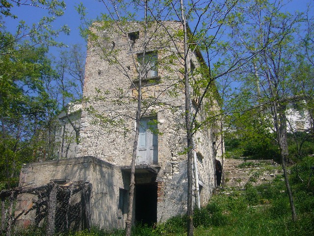 two ruins and barn